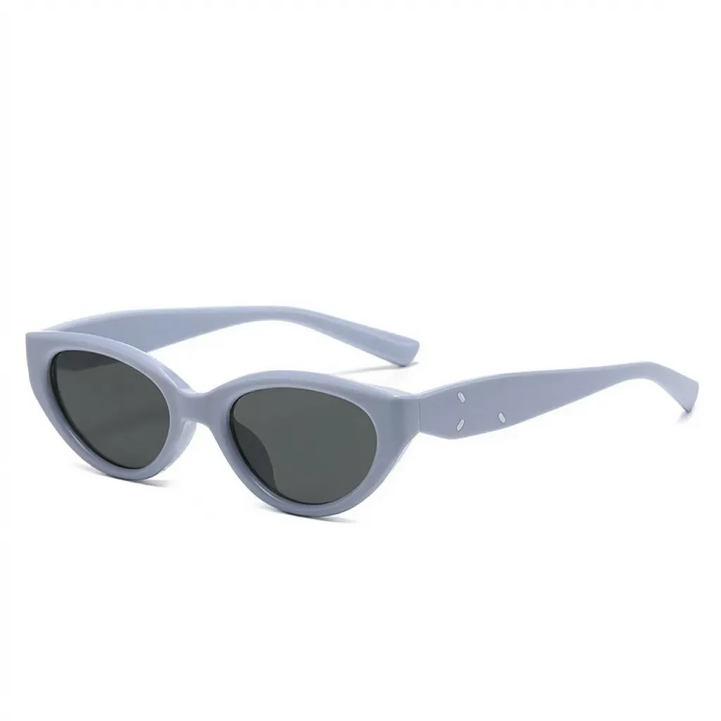 Modern sky blue translucent oval frames with dark smoke lenses, minimalist vintage eyewear.