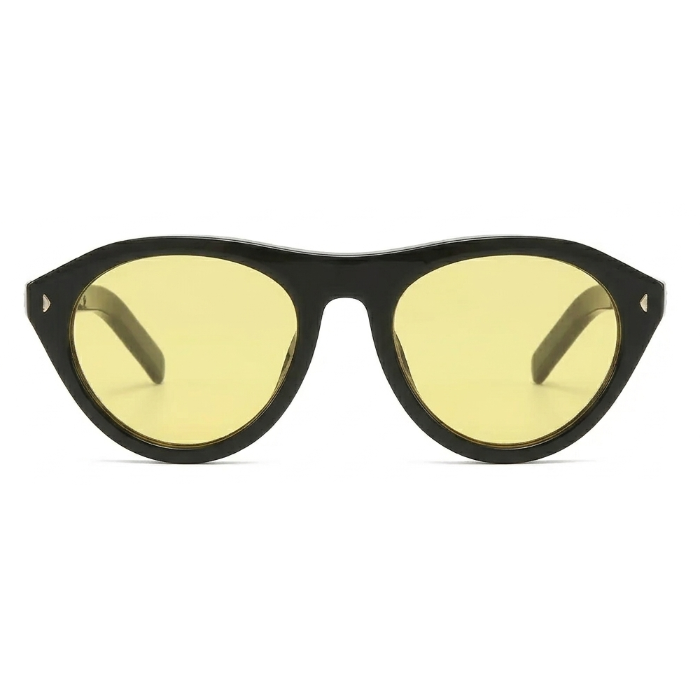 Bold Onyx Black aviator frames with high-visibility sunshine yellow lenses, night-vision aesthetic.