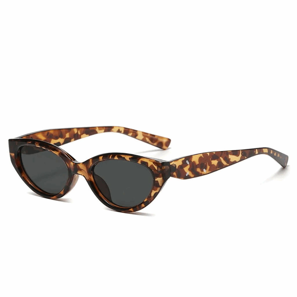 Vintage Amber Tortoise Shell slim cat-eye glasses with dark lenses, classic leopard print shades.