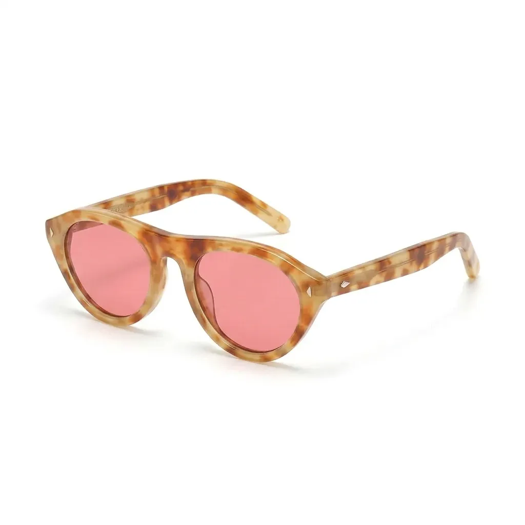 Classic Amber Tortoise retro sunglasses with soft coral pink tinted lenses.